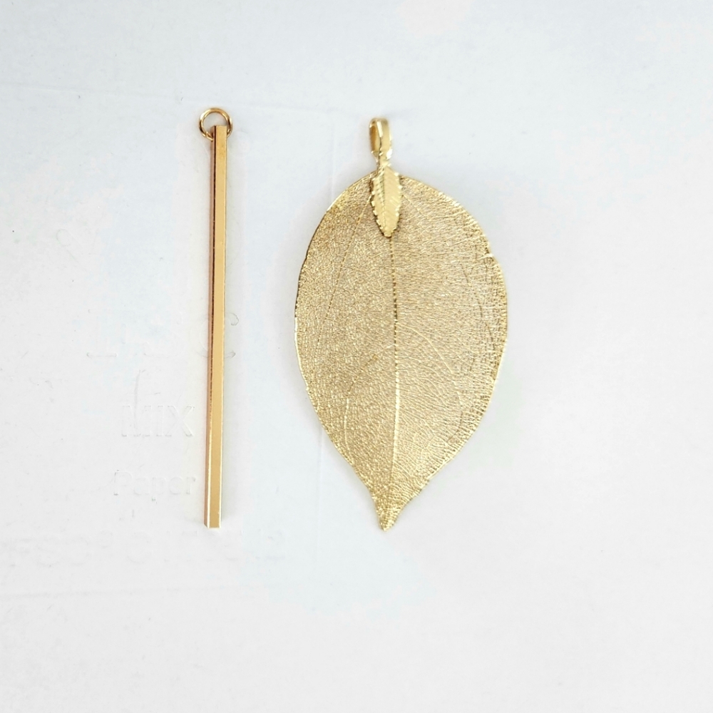 Gold toned two necklace pendants